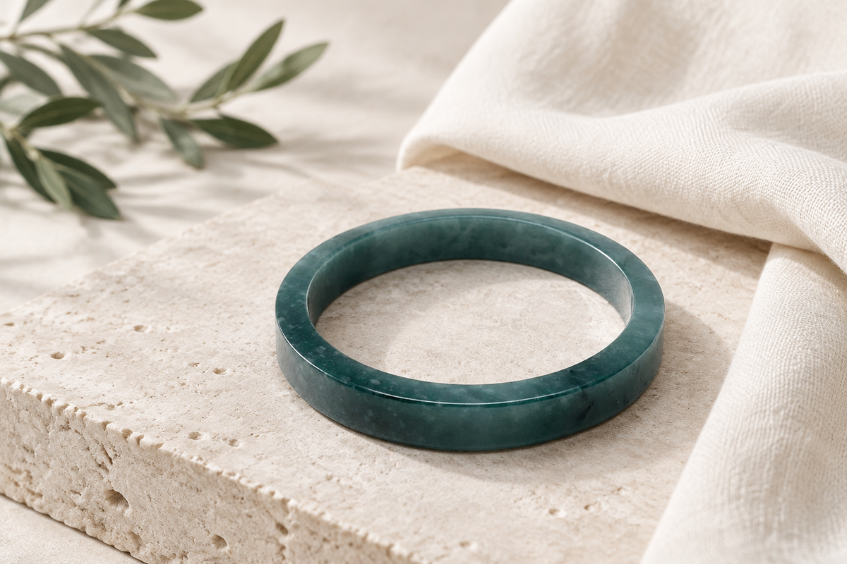 Illustrative cover inspired by a 70.5 mm artisan-carved Princesa Blue Guatemalan jadeite bangle, not a depiction of a verified mine site